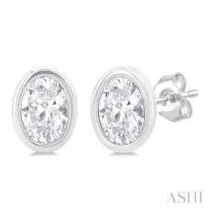 1/5 ctw Petite Bezel Set Oval Cut Diamond Fashion Stud Earring in 10K White Gold