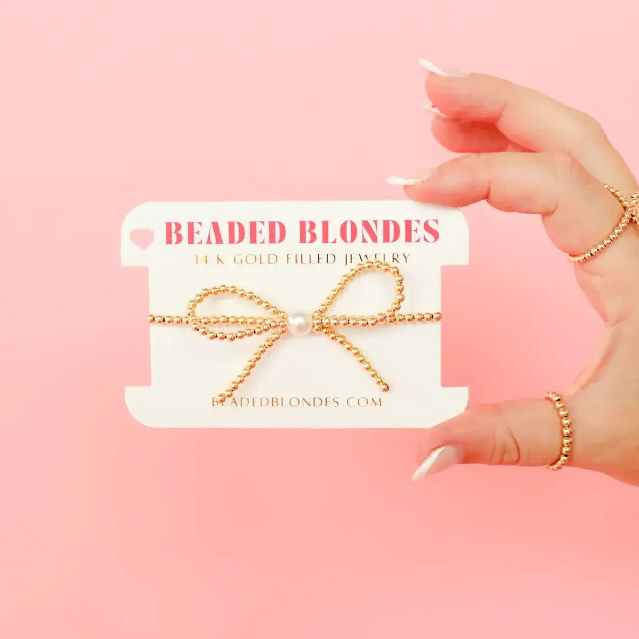 Gold Bow Bracelet: Extended 7.25