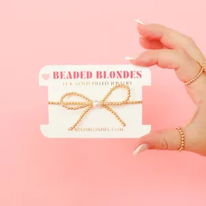 Gold Bow Bracelet: Extended 7.25