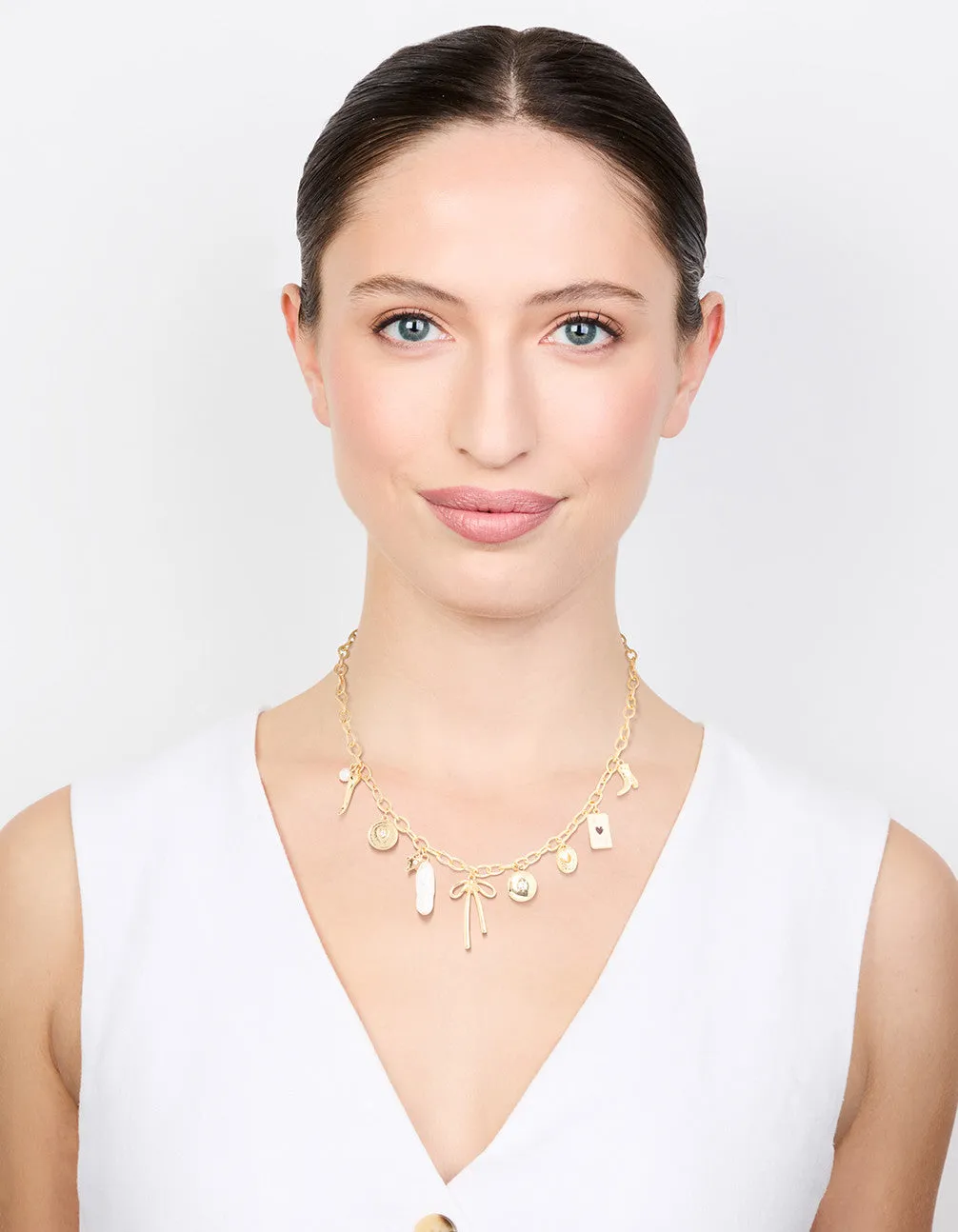 Gold Plated Bow & Star Charm Necklace
