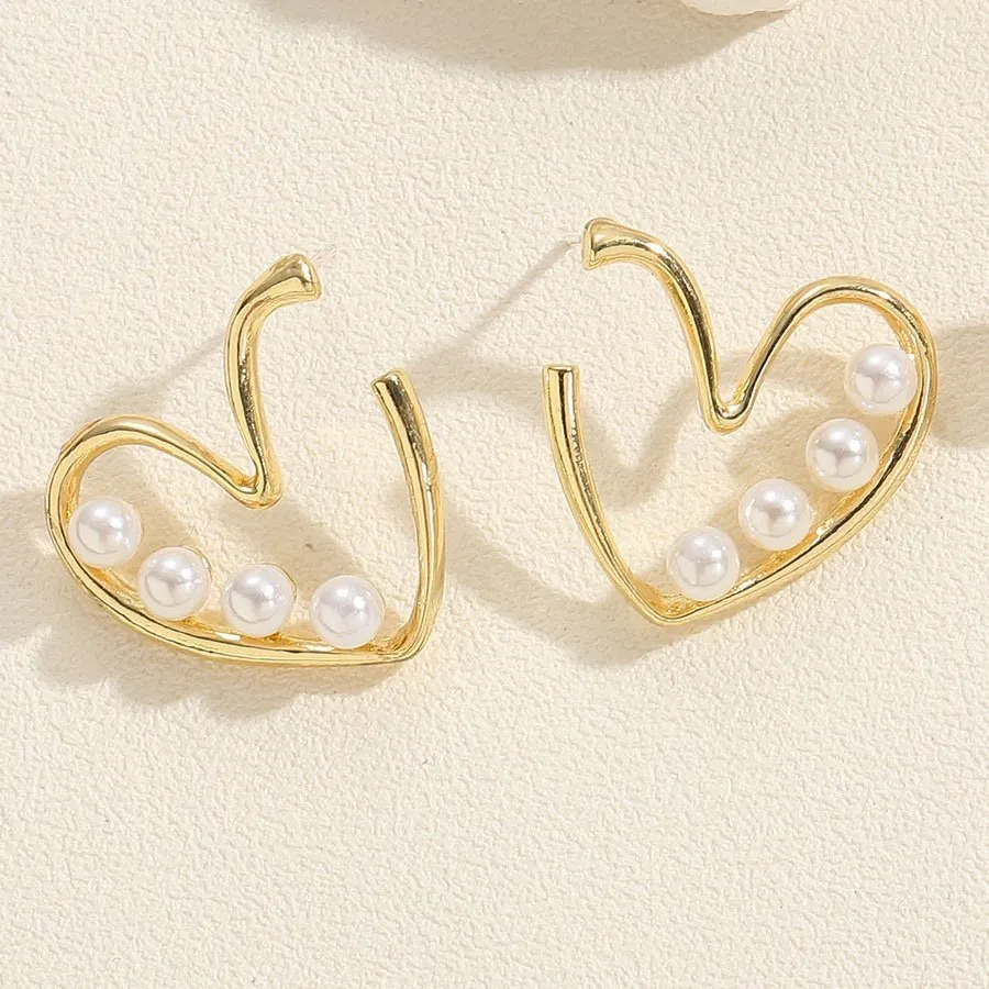 Gold plated heart pearl stud earrings