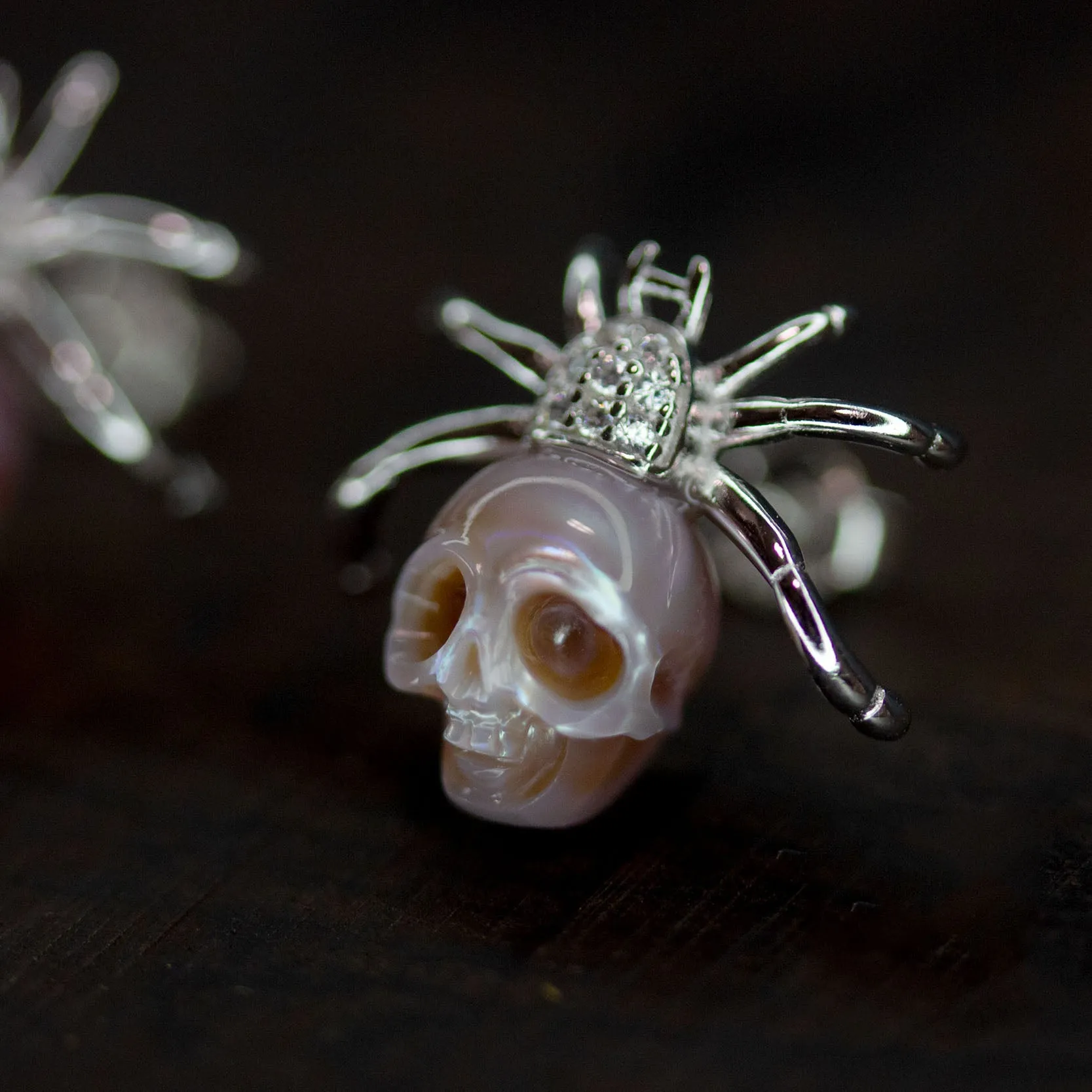 Hand-Carved Pearl Skull Spider Stud Earrings