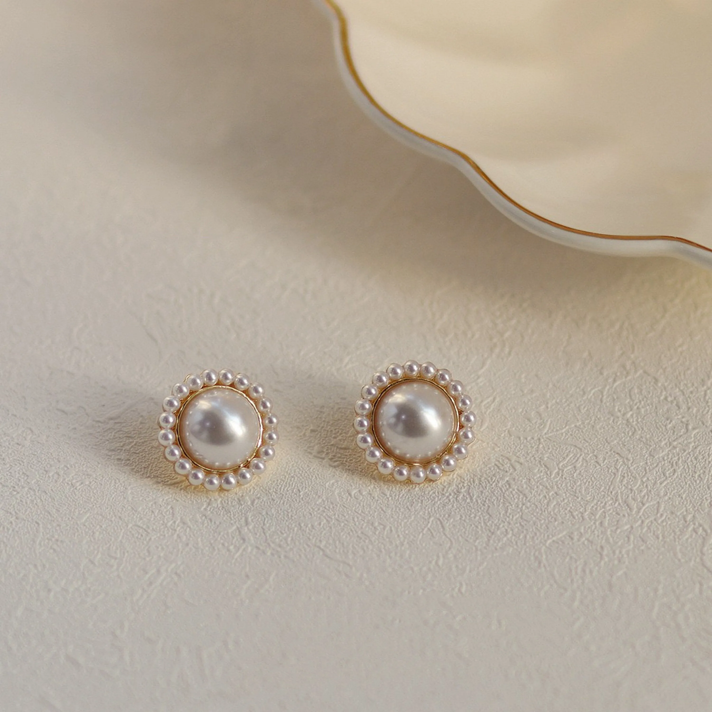 Large ivory pearl stud earrings
