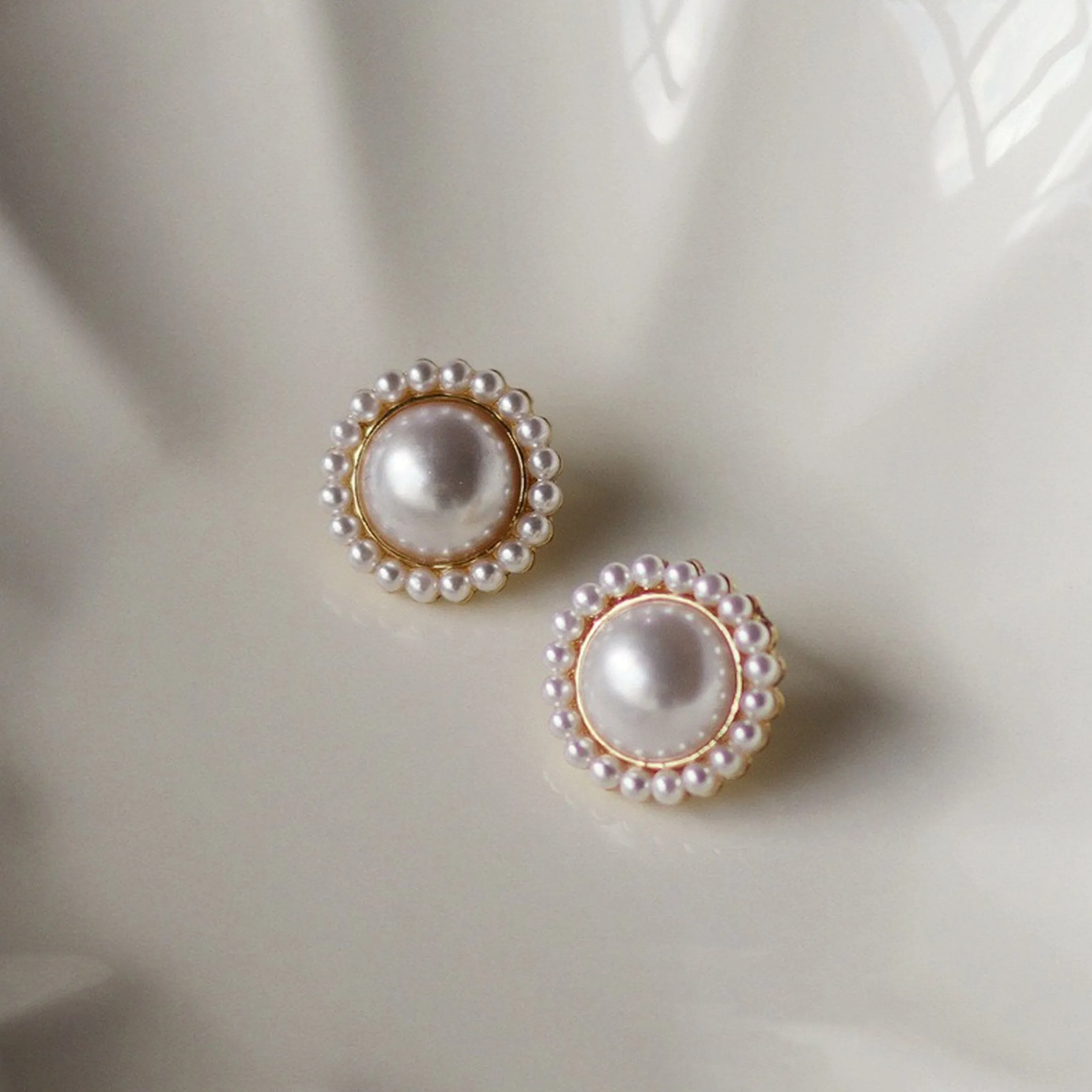 Large ivory pearl stud earrings