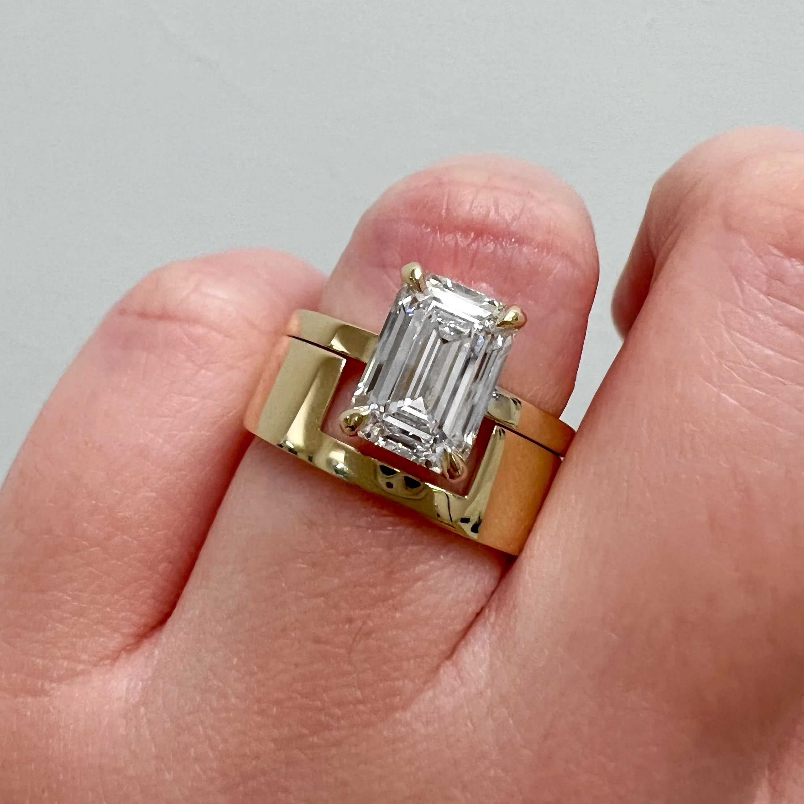 Mid-Century Kahn Emerald Ring with Cigar Band