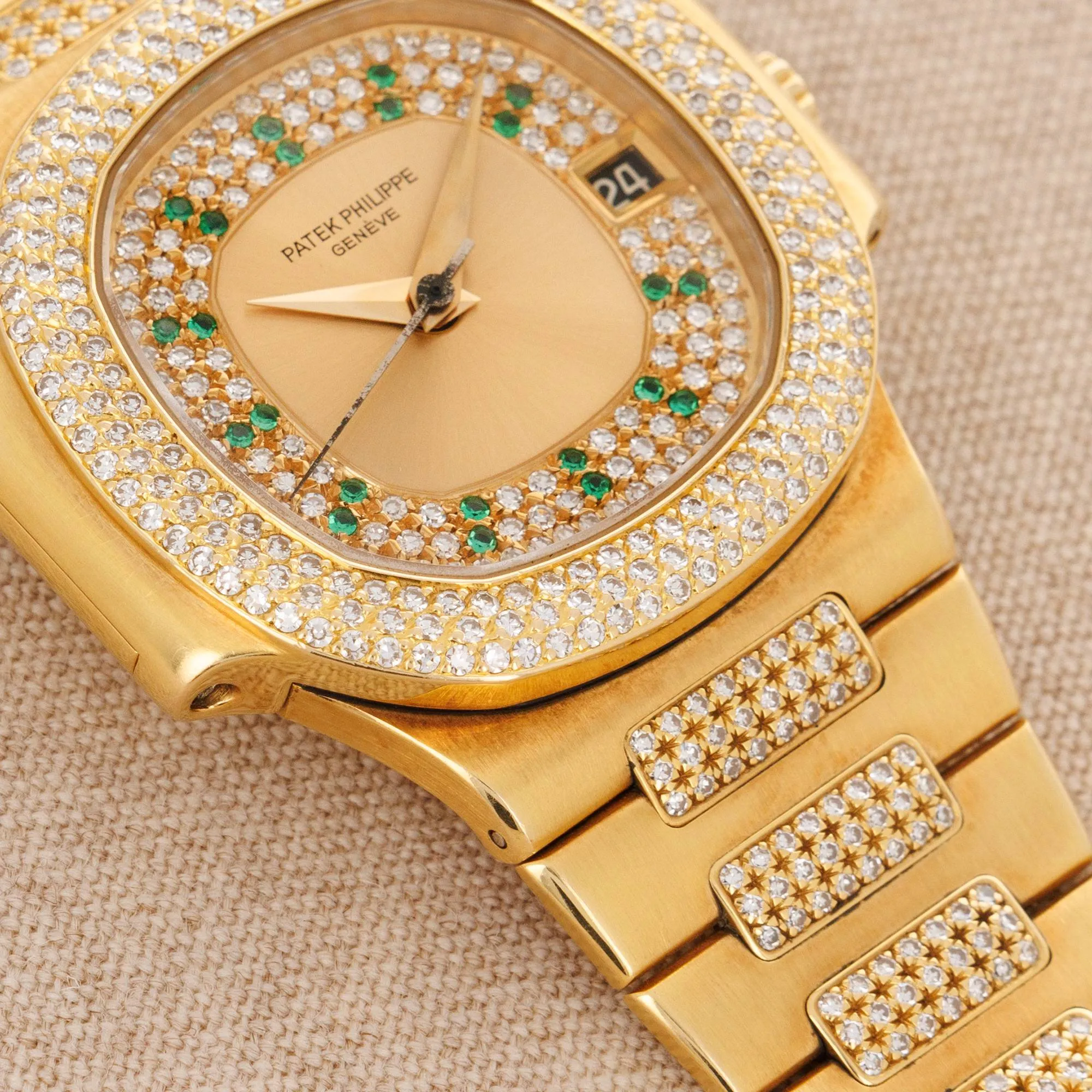 Patek Philippe Yellow Gold Nautilus Ref. 3800/105 with Pave Diamond and Emerald