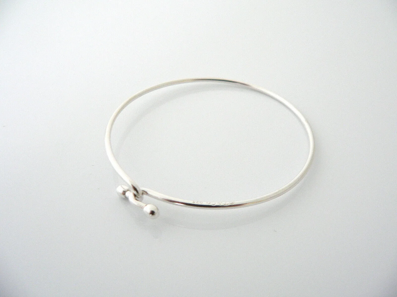 Tiffany & Co Silver Love Knot Hook Bangle Bracelet Infinity Interlocking Gift