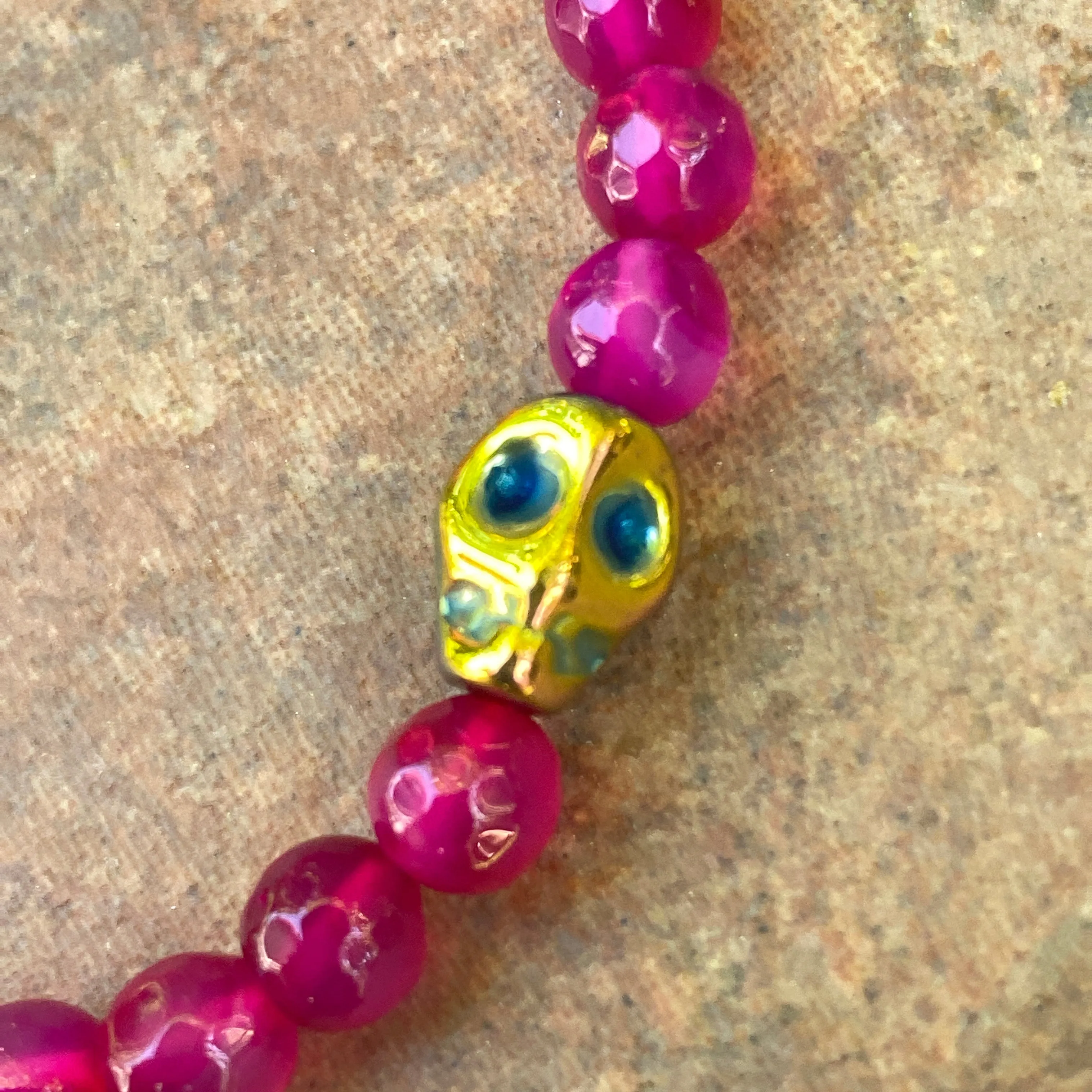 Women’s Pink Agate and Hematite Skull  Gemstone "Curse" Stretch Bracelet