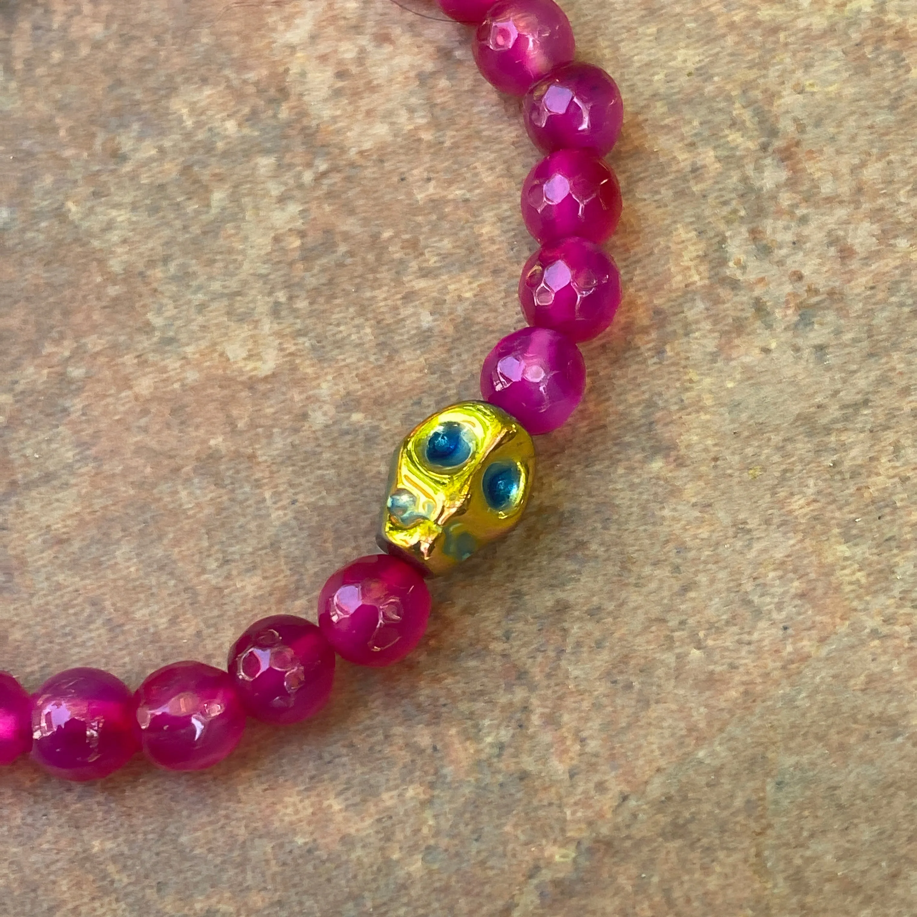 Women’s Pink Agate and Hematite Skull  Gemstone "Curse" Stretch Bracelet